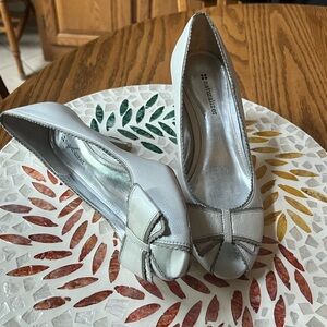 Off white dress pumps.